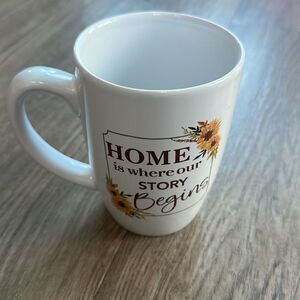 NEW Home is where our story begins mug